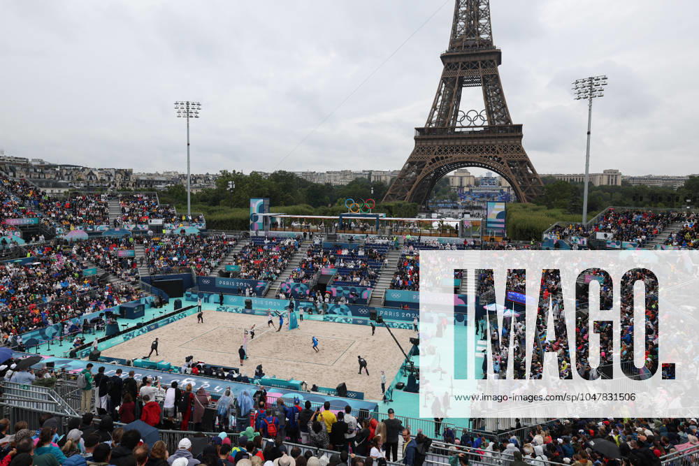 (240727) -- PARIS, July 27, 2024 -- Noslen Diaz Amaro Jorge Luis Alayo Moliner of Cuba and Miles Partain Andrew Benesh of the United States compete during the men s pool D Beach volleyball, Beachvolleyball match between the United States and Cuba at the Paris 2024 Olympic Games, Olympische Spiele, Olympia, OS in Paris, France, on July 27, 2024. Huang Zongzhi) (PARIS2024)FRANCE-PARIS-BEACH VOLLEYBALL-MEN S PRELIMINARY huangzongzhi