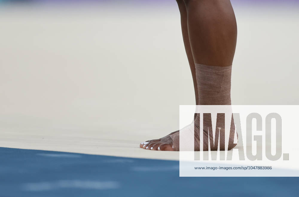 (240728) -- PARIS, July 28, 2024 -- Simone Biles of the United States is pictured as she got injured during her warm-up before the floor exercise event of the artistic gymnastics women s qualification match during the Paris 2024 Olympic Games, Olympische Spiele, Olympia, OS at Bercy Arena in Paris, France, July 28, 2024. Cao Can) (PARIS2024)FRANCE-PARIS-OLY-ARTISTIC GYMNASTICS CaoCan