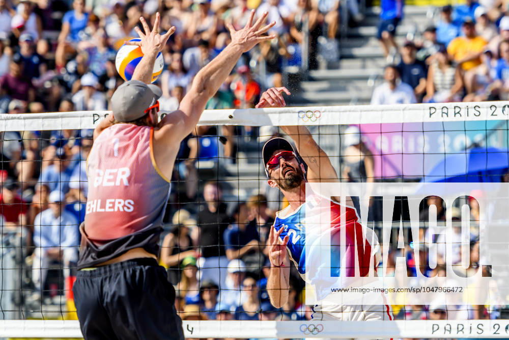 FRA, Summer Olympics Paris 2024, Beach Volleyball , Preliminary Round Group C, Match 3, Ehlers Wickler GER vs Bassereau Lyneel FRA 30 07 2024, Champ de Mars, Paris, FRA, Summer Olympics Paris 2024, Beach Volleyball , Preliminary Round Group C, Match 3, Ehlers Wickler GER vs Bassereau Lyneel FRA , pictured Ehlers Nils GER vs Lyneel Julien FRA nordphotoxGmbHx xStraubmeier nph00004