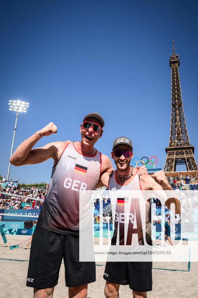 Paris, Eiffel Tower Stadium Beach volleyball, Olympic Games, preliminary round Nils Ehlers left and Clemens Wickler GER cheering after victory