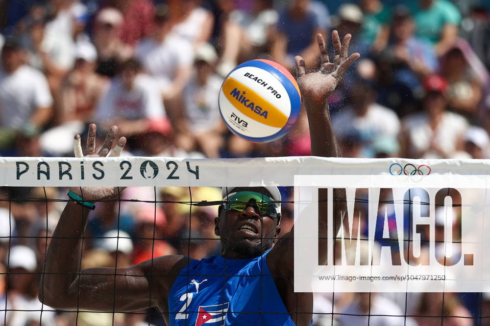 FRANCE, PARIS - JULY 30, 2024: Jorge Luis Alayo Moliner of Cuba competes in a men s Pool D - Preliminary Phase Beach volleyball, Beachvolleyball match between Brazil and Cuba at the 2024 Summer Olympic Games, Olympische Spiele, Olympia, OS by the Eiffel Tower on the Champ de Mars. Alexander Shcherbak TASS 72537935