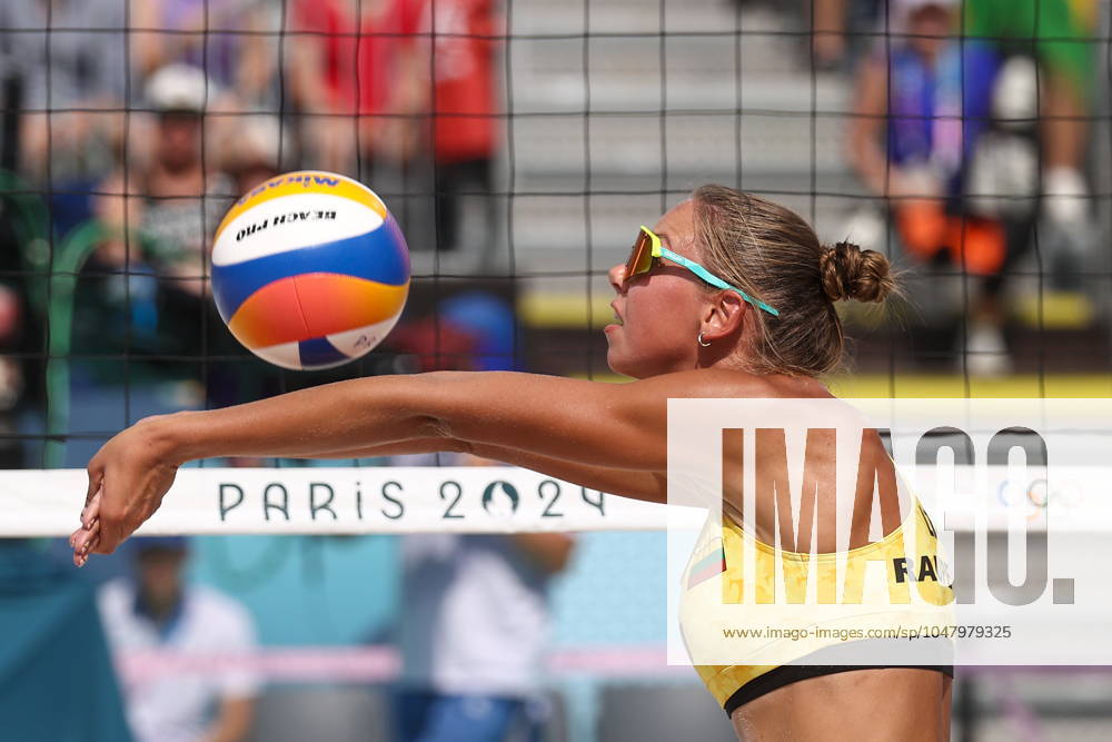 RUSSIA, PARIS - JULY 30, 2024: Lithuania s Aine Raupelyte plays a womenâ€s Pool E Beach volleyball, Beachvolleyball match against Brazil during the 2024 Summer Olympics at the Eiffel Tower Stadium on the Champ de Mars. Alexander Shcherbak TASS 72546268