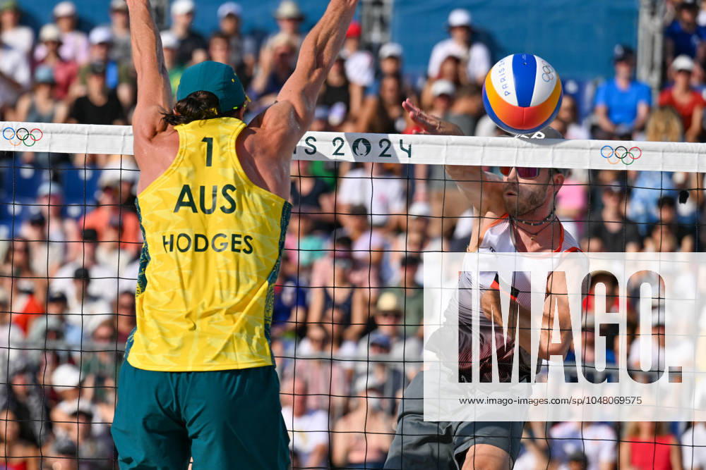 Olympic Games Beach Volleyball Paris 01 08 2024 Preliminary round, men, GER AUS, Clemens Wickler 2, GER , in attack against 1 Thomas Hodges AUS,