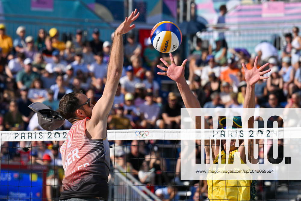 Olympic Games Beach Volleyball Paris 01 08 2024 Preliminary round, men, GER AUS, Clemens Wickler 2, GER , in attack against 1 Thomas Hodges AUS, loses cap,