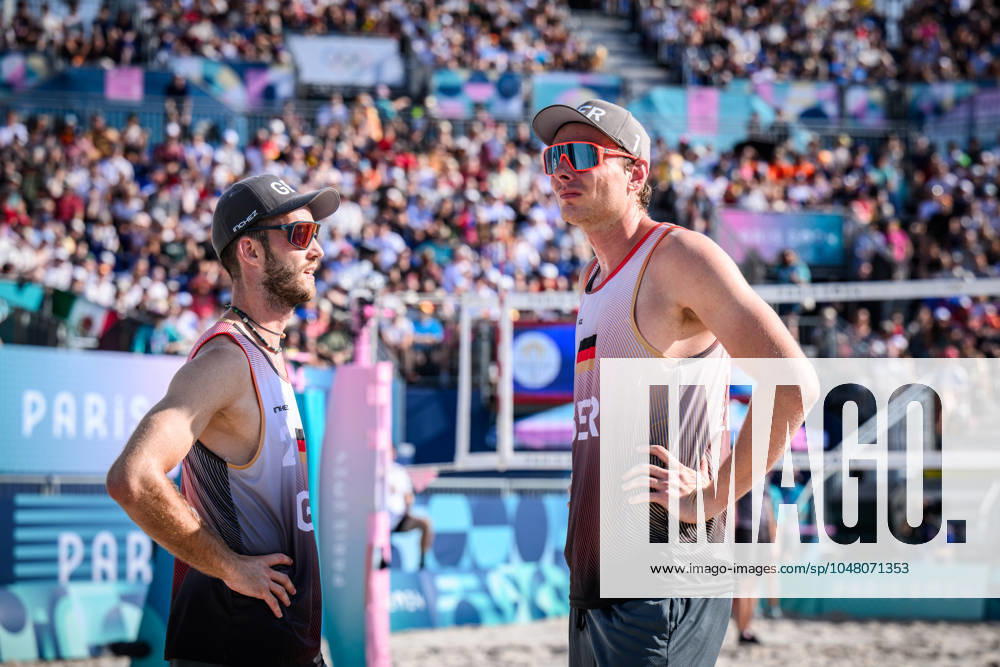 Paris, Eiffel Tower Stadium Beach volleyball, Olympic Games, preliminary round Clemens Wickler left and Nils Ehlers GER pensive