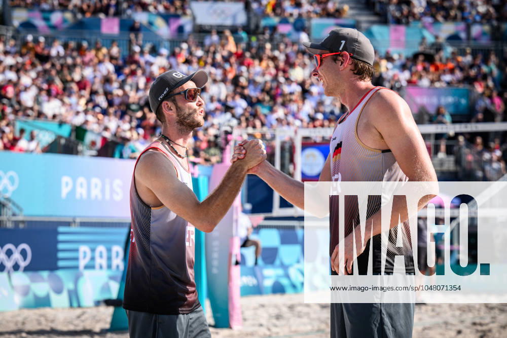 Paris, Eiffel Tower Stadium Beach volleyball, Olympic Games, preliminary round Clemens Wickler left and Nils Ehlers GER Shakehands