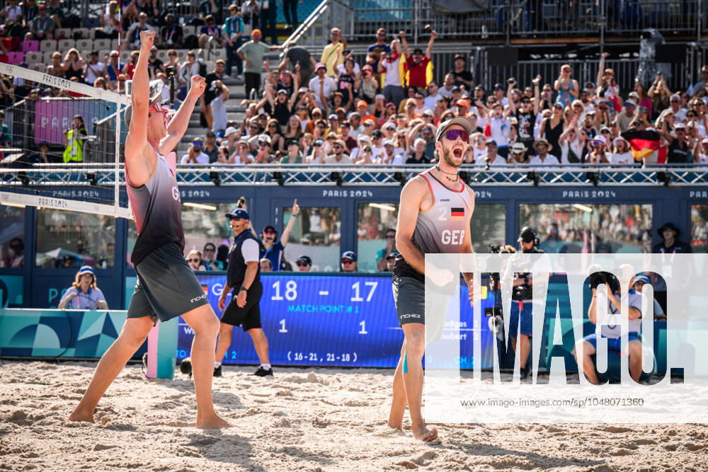 Paris, Eiffel Tower Stadium Beach volleyball, Olympic Games, preliminary round Nils Ehlers left and Clemens Wickler GER cheering after winning match point