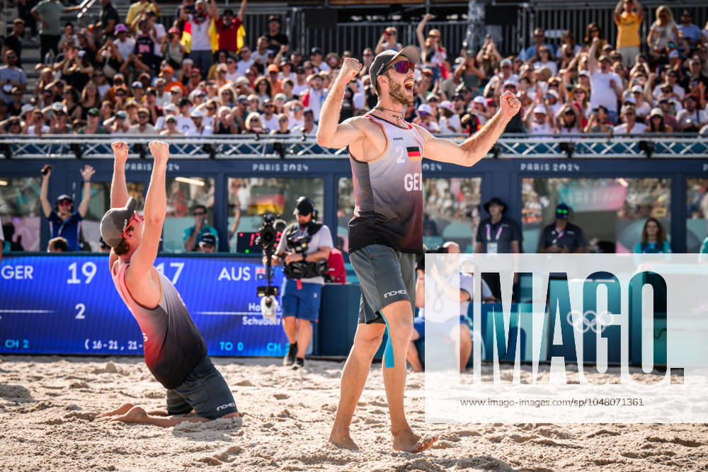 Paris, Eiffel Tower Stadium Beach volleyball, Olympic Games, preliminary round Nils Ehlers left and Clemens Wickler GER cheering after winning match point