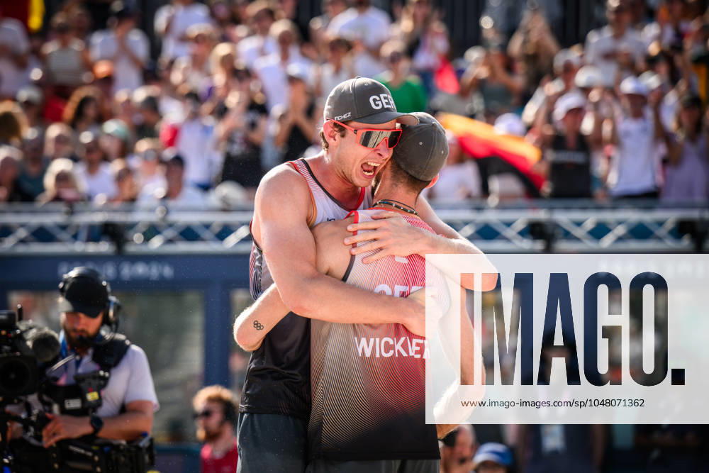 Paris, Eiffel Tower Stadium Beach volleyball, Olympic Games, preliminary round Nils Ehlers left and Clemens Wickler GER cheering after winning match point