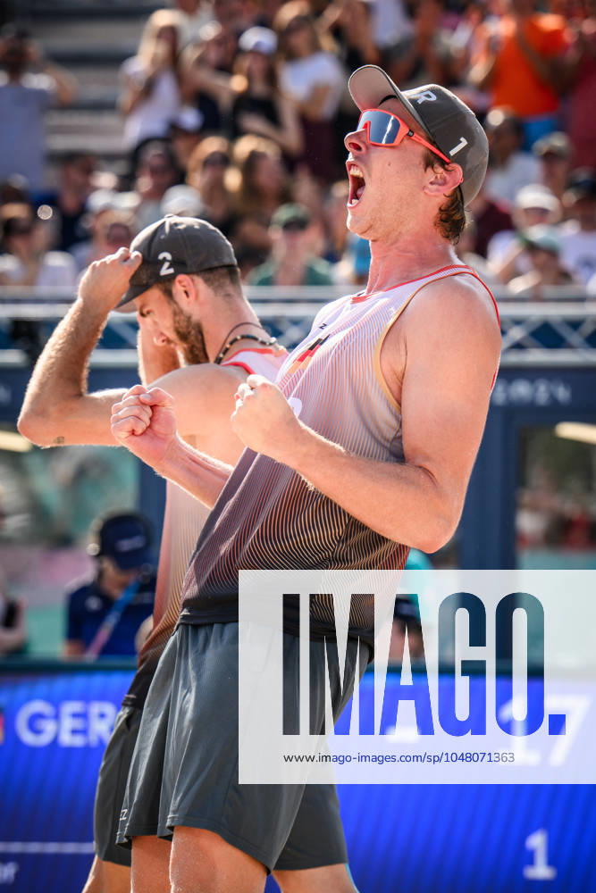 Paris, Eiffel Tower Stadium Beach volleyball, Olympic Games, preliminary round Nils Ehlers left and Clemens Wickler GER cheering after winning match point