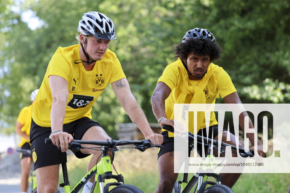 Julian Brandt Borussia Dortmund and Karim Adeyemi Borussia Dortmund ride their bikes to the training ground, Day 1, Borussia Dortmund training camp, , 01 08 2024, Bad Ragaz, Switzerland