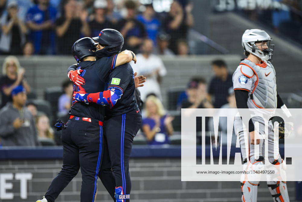 Toronto Blue Jays Vladimir Guerrero Jr. (centre) celebrates with Daulton Varsho (left) after hitting a two-run home run during the fifth inning of MLB, Baseball Herren, USA baseball action against the Baltimore Orioles, in Toronto, on Thursday, August 8, 2024. Canada News - August 8, 2024 - ZUMAc35_ 20240808_zaf_c35_179