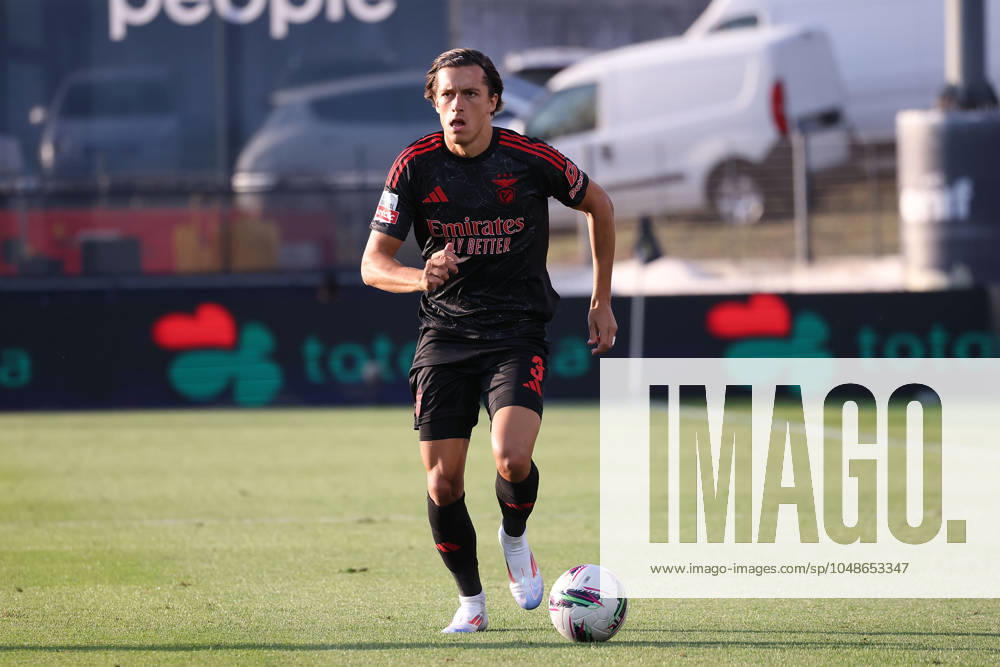 2024 08 11 1 ª jornada da Liga Portugal Betclic, Futebol Clube de Famalicao Sport Lisboa e Benfica v l , Alvaro Fernandez Carreras S L Benfica , on the ball, cropped, single image, full body, action, action, game scene