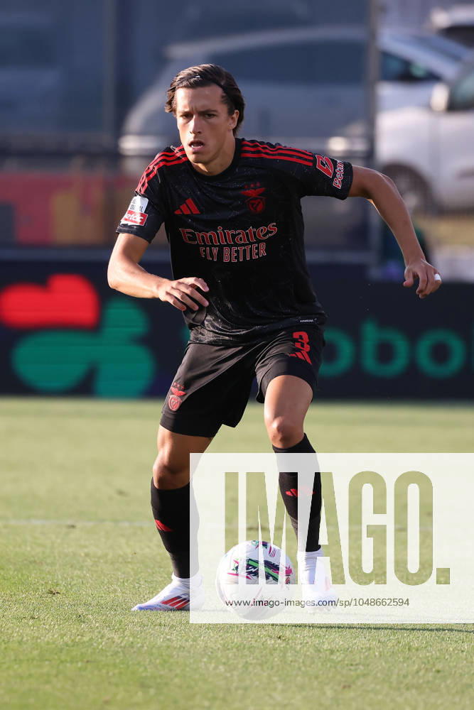 2024 08 11 1 ª jornada da Liga Portugal Betclic, Futebol Clube de Famalicao Sport Lisboa e Benfica v l , Alvaro Fernandez Carreras S L Benfica , on the ball, cropped, single image, full body, action, action, game scene
