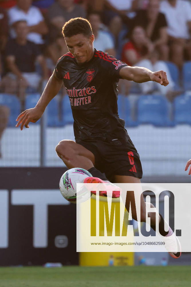 2024 08 11 1 ª jornada da Liga Portugal Betclic, Futebol Clube de Famalicao Sport Lisboa e Benfica v l , Alexander Bah S L Benfica , on the ball, cropped image, single image, full body, action, action, game scene