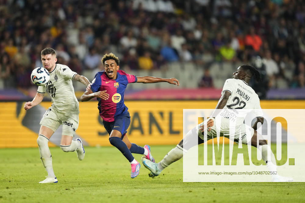 FC Barcelona, Barca v AS Monaco - Trofeu Joan Gamper Lamine Yamal right wingerof Barcelona and Spain and Mohammed Salisu centre-back of Monaco and Ghana compete for the ball during the Joan Gmaper Trophy match between FC Barcelona and AS Monaco at Estadi Olimpic Lluis Companys on August 12, 2024 in Barcelona, Spain. Barcelona Spain