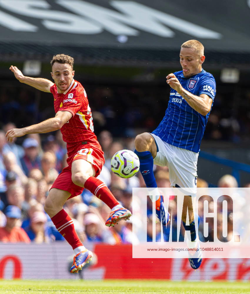 Football - FA Premier League - Ipswich Town FC v Liverpool FC IPSWICH, ENGLAND - Saturday, August 17, 2024: Liverpool s Diogo Jota (L) is challenged by Ipswich Town s Luke Woolfenden during the FA Premier League match between Ipswich Town FC and Liverpool FC at Portman Road. (Photo by David Rawcliffe Propaganda) IPSWICH Portman Road SUFFOLK ENGLAND