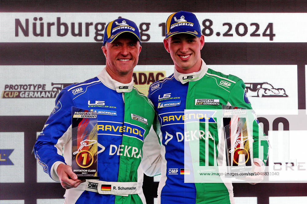 Motorsport DTM Saison 2024,DTM Rennen Nürburgring, v l Ralf Schumacher US Racing , Ligier LMP3 Prototyp jubilates over the victory with David Schumacher US Racing Ligier LMP3 Prototyp Siegerehrung Podium DTM REGULATIONS PROHIBIT ANY USE OF PHOTOGRAPHS as IMAGE SEQUENCES and or QUASI VIDEO Nürburg