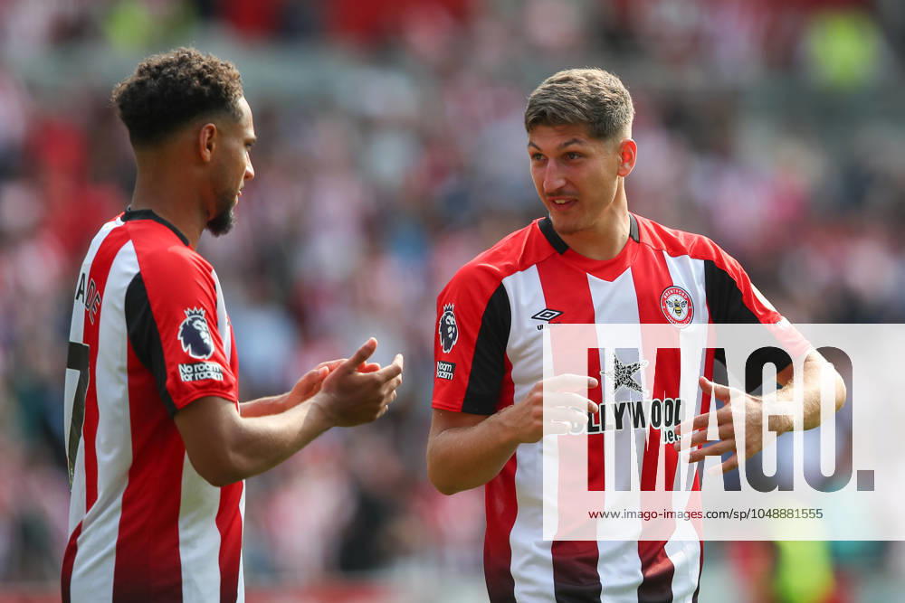 Premier League Brentford v Crystal Palace Vitaly Janelt of Brentford speaks with Kevin Schade of Brentford at full time during the Premier League match Brentford vs Crystal Palace at The Gtech Community Stadium, London, United Kingdom, 18th August 2024 (Photo by Gareth Evans News Images) London The Gtech Community Stadium Greater London United Kingdom