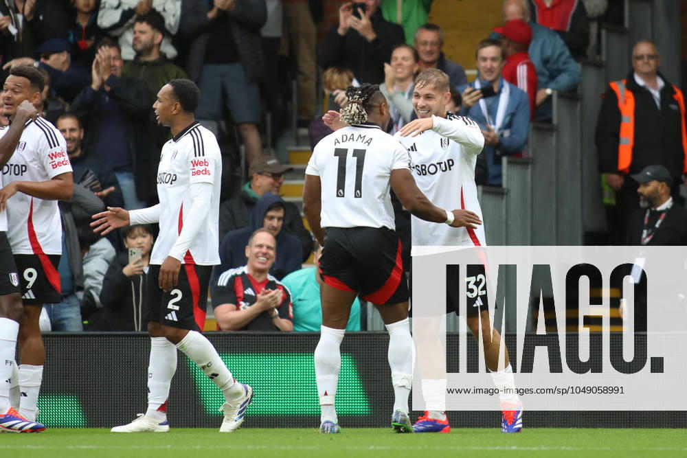 London, England, August 24th 2024: Emile Smith Rowe (32 Fulham) celebrates with Adama Traore (11 Fulham) after scoring a goal during the Premier League game between Fulham and Leicester City at Craven Cottage in London, England (Alexander Canillas SPP)