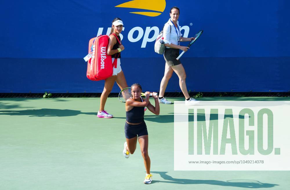 Emma Raducanu walks past Leylah Fernandez on the practice courts - Raducanu beat Fernandez when she won the US Open title in 2021 US Open Championships 2024, Day Two, Flushing Meadows, New York, USA - 27 Aug 2024