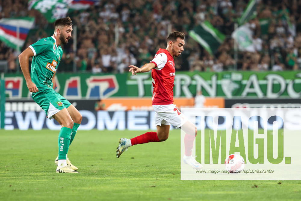 SOCCER - UEFA EL, Rapid vs Braga VIENNA,AUSTRIA,29.AUG.24 - SOCCER - UEFA Europa League, qualification, SK Rapid Wien vs Sporting Club de Braga. Image shows Dion Beljo (Rapid) and Ricardo Horta (Braga). GEPAxpictures Rauthner
