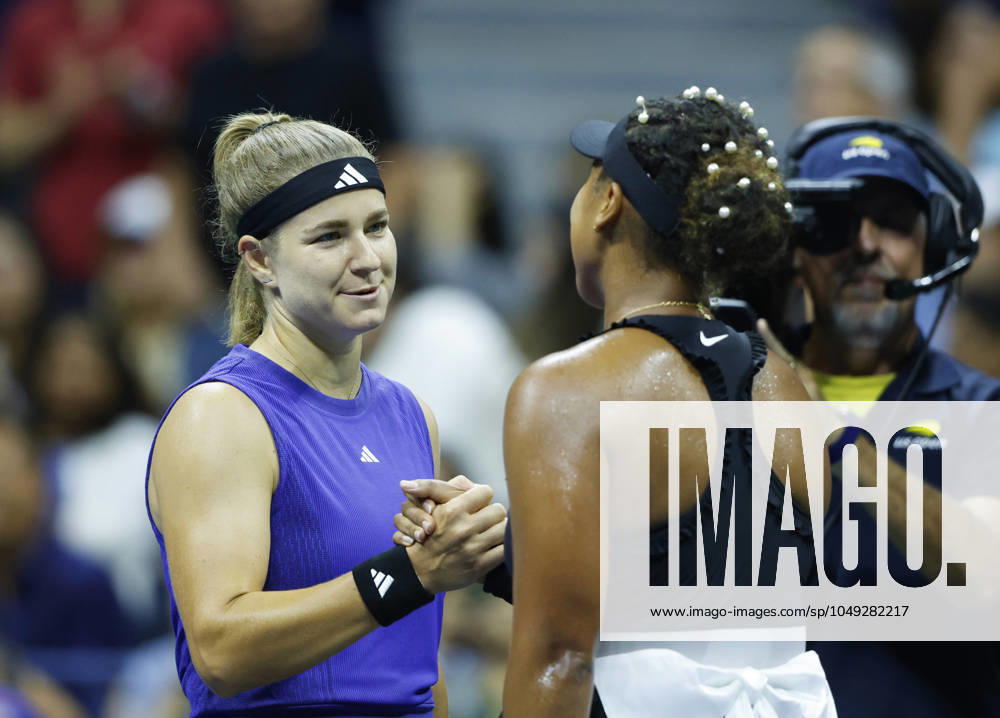 Karolina Muchova shakes hands with Naomi Osaka at net after defeating Osaka in straight sets in the second round in Arthur Ashe Stadium of the 2024 US Open Tennis Championships in at the USTA Billie Jean King National Tennis Center on Thursday, August 29, 2024 in New York City. NYP20240829116 JOHNxANGELILLO