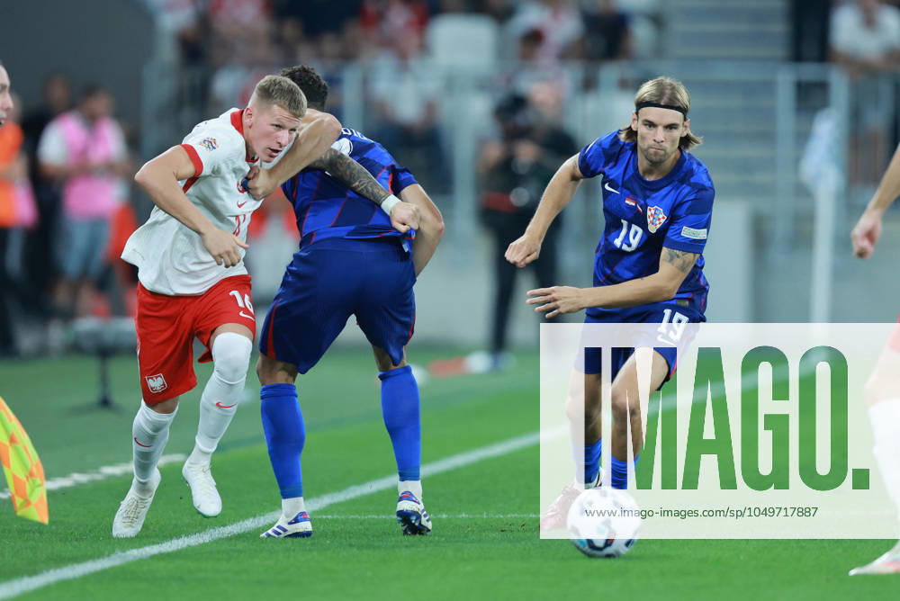 Croatia v Poland - UEFA Nations League 2024 25 League A Group A1 OSIJEK, CROATIA - SEPTEMBER 8: Player of Poland Mateusz Bogusz (L) and players of Croatia Josko Gvardiol (C) and Borna Sosa (R) fight over the ball during the UEFA Nations League 2024 25 League A Group A1 match between Croatia and Poland at on September 8, 2024 in Osijek, Croatia. DavorxJavorovicj Pixsell