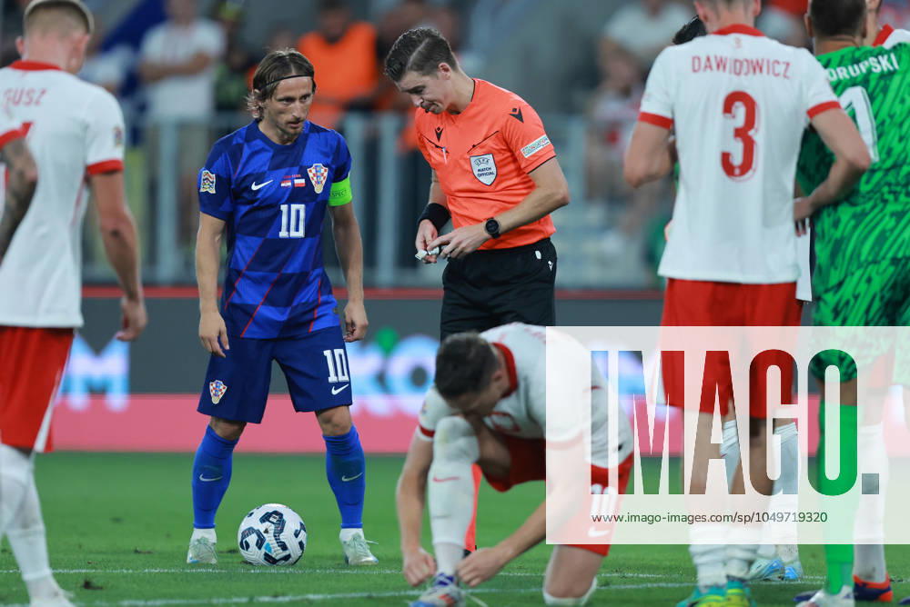 Croatia v Poland - UEFA Nations League 2024 25 League A Group A1 OSIJEK, CROATIA - SEPTEMBER 8: Player of Croatia Luka Modric listens to the referee before shooting a goal during the UEFA Nations League 2024 25 League A Group A1 match between Croatia and Poland at on September 8, 2024 in Osijek, Croatia. DavorxJavorovic Pixsell