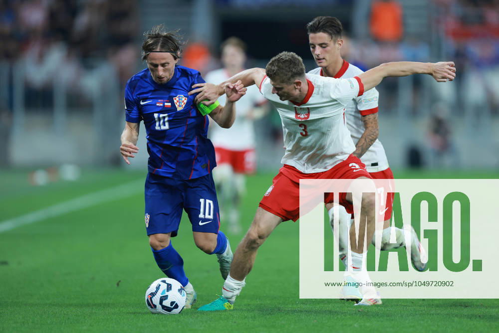 Croatia v Poland - UEFA Nations League 2024 25 League A Group A1 OSIJEK, CROATIA - SEPTEMBER 8: Player of Croatia Luka Modric and player of Poland Pawel Dawidowicz fight for a ball during the UEFA Nations League 2024 25 League A Group A1 match between Croatia and Poland at on September 8, 2024 in Osijek, Croatia. DavorxJavorovic Pixsell