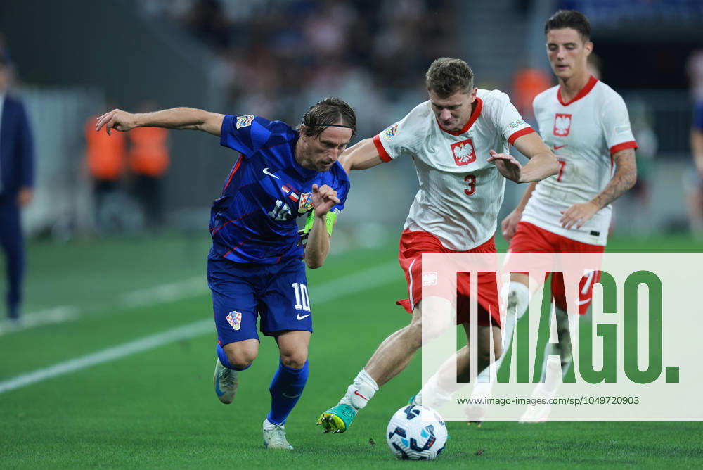 Croatia v Poland - UEFA Nations League 2024 25 League A Group A1 OSIJEK, CROATIA - SEPTEMBER 8: Player of Croatia Luka Modric and player of Poland Pawel Dawidowicz fight for a ball during the UEFA Nations League 2024 25 League A Group A1 match between Croatia and Poland at on September 8, 2024 in Osijek, Croatia. DavorxJavorovic Pixsell