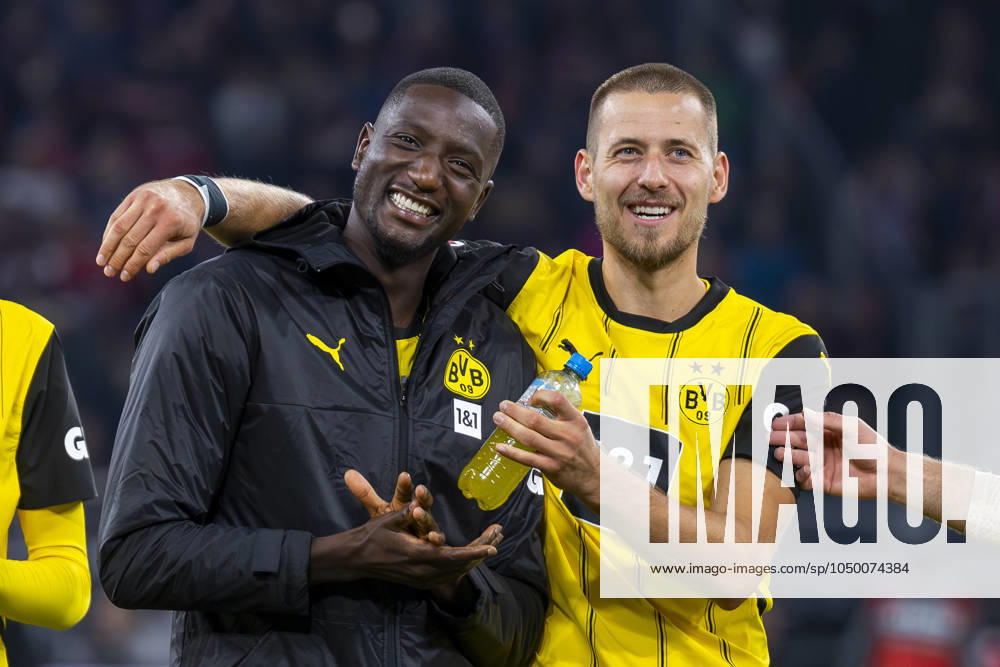 Football Borussia Dortmund 1 FC Heidenheim, Matchday 3 at Signal Iduna Park Dortmunds Serhou Guirassy l and Dortmunds Waldemar Anton celebrate in front of the fans IMPORTANT NOTE In accordance with the regulations of the DFL and the DFB, it is prohibited to use or have used photographs taken in the stadium and or of the match in the form of sequential images and or video-like photo series