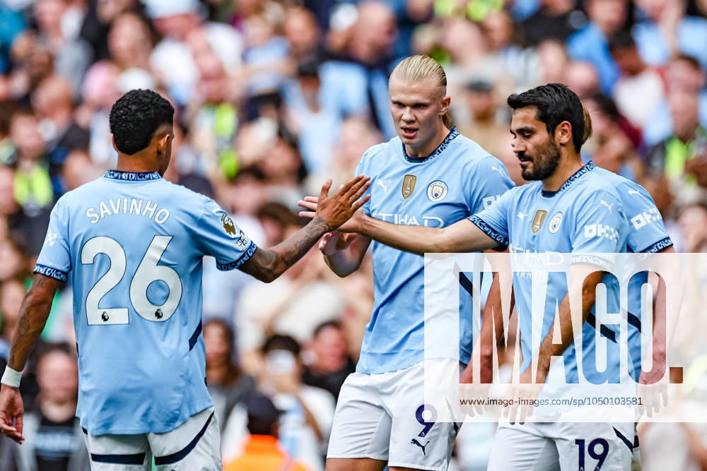 Premier League Manchester City v Brentford Erling Haaland of Manchester City celebrates his goal to make it 2-1 with Savinho of Manchester City and İlkay GündoÄüan of Manchester City during the Premier League match Manchester City vs Brentford at Etihad Stadium, Manchester, United Kingdom, 14th September 2024 (Photo by Mark Cosgrove News Images) Manchester Etihad Stadium Manchester United, ManU Kingdom
