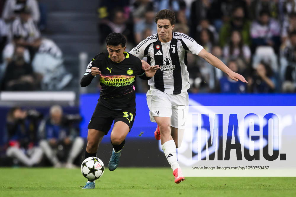 Juventus FC v PSV Eindhoven - UEFA Champions League Richard Ledezma of PSV Eindhoven comeptes for the ball with Kenan Yildiz of Juventus FC during the UEFA Champions League football match between Juventus FC and PSV Eindhoven. Turin Italy