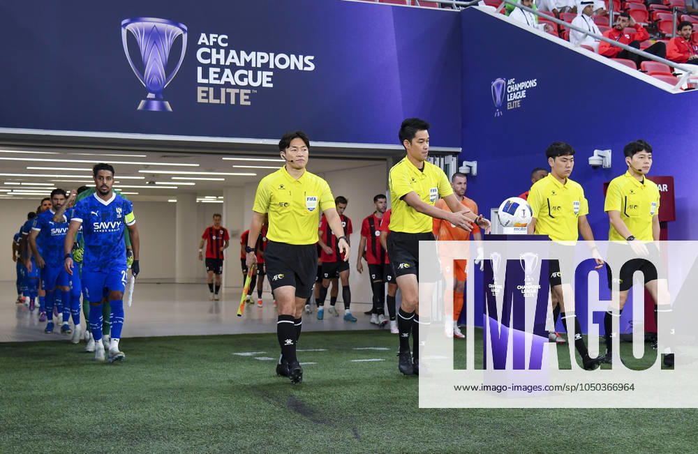 AFC CHAMPIONS LEAGUE ELITE, AL RAYYAN FC V AL-HILAL SFC Al-Hilal SFC and Al Rayyan SC players walk onto the pitch before the AFC Champions League elite west football match between Qatar s Al Rayyan SC and Saudi Arabia s Al-Hilal SFC at Ahmad Bin Ali Stadium in Al Rayyan, Qatar on September 17, 2024. DOHA Qatar