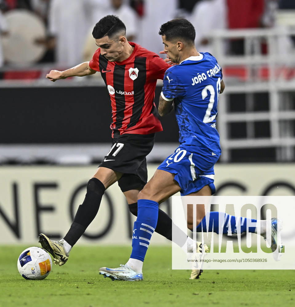 AFC CHAMPIONS LEAGUE ELITE, AL RAYYAN FC V AL-HILAL SFC Achraf Benchark (L) of Al Rayyan SC and Joao Cancelo of Al-Hilal SFC in action during the AFC Champions League elite west football match between Qatar s Al Rayyan SC and Saudi Arabia s Al-Hilal SFC at Ahmad Bin Ali Stadium in Al Rayyan, Qatar on September 17, 2024. DOHA Qatar