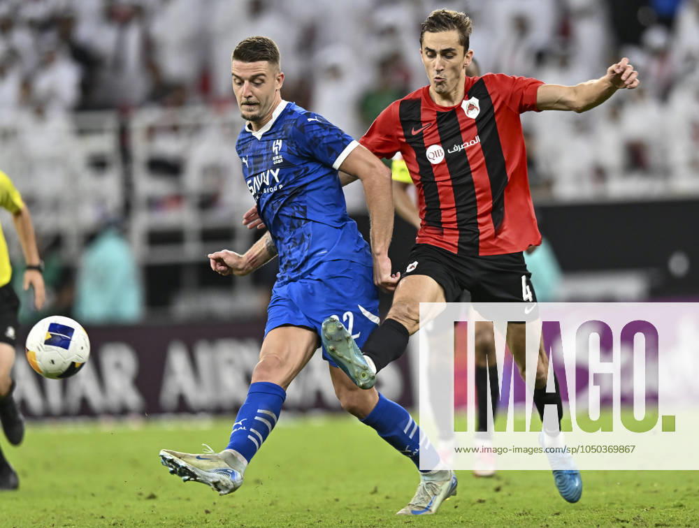 AFC CHAMPIONS LEAGUE ELITE, AL RAYYAN FC V AL-HILAL SFC Julien De Sart (R) of Al Rayyan SC and Sergej of Al-Hilal SFC in action during the AFC Champions League elite west football match between Qatar s Al Rayyan SC and Saudi Arabia s Al-Hilal SFC at Ahmad Bin Ali Stadium in Al Rayyan, Qatar on September 17, 2024. DOHA Qatar