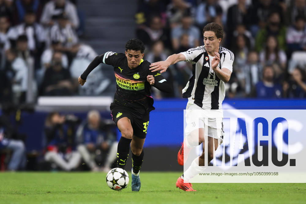 Juventus FC v PSV Eindhoven - UEFA Champions League Richard Ledezma of PSV Eindhoven competes for the ball with Kenan Yildiz of Juventus FC during the UEFA Champions League football match between Juventus FC and PSV Eindhoven. Turin Italy