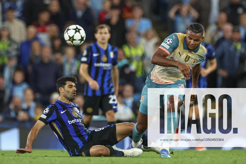 UEFA Champions League league stage Manchester City v Inter Milan Mehdi Tarem of Inter Milan and Manuel Akanji of Manchester City battle for the ball during the UEFA Champions League league stage match Manchester City vs Inter Milan at Etihad Stadium, Manchester, United Kingdom, 18th September 2024 (Photo by Mark Cosgrove News Images) Manchester Etihad Stadium Manchester United, ManU Kingdom