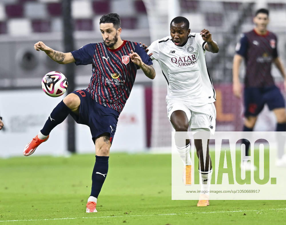 AL-SADD SC VS AL DUHAIL SC-OOREDOO STARS LEAGUE QATAR Mohamed Camara (R) of Al-Sadd SC and Luis Alberto (L) of Al Duhail SC in action during the Ooredoo Qatar Stars League 24 25 match between Al-Sadd SC and Al Duhail SC at Jassim bin Hamad Stadium in Doha, Qatar, on September 21, 2024. DOHA Qatar
