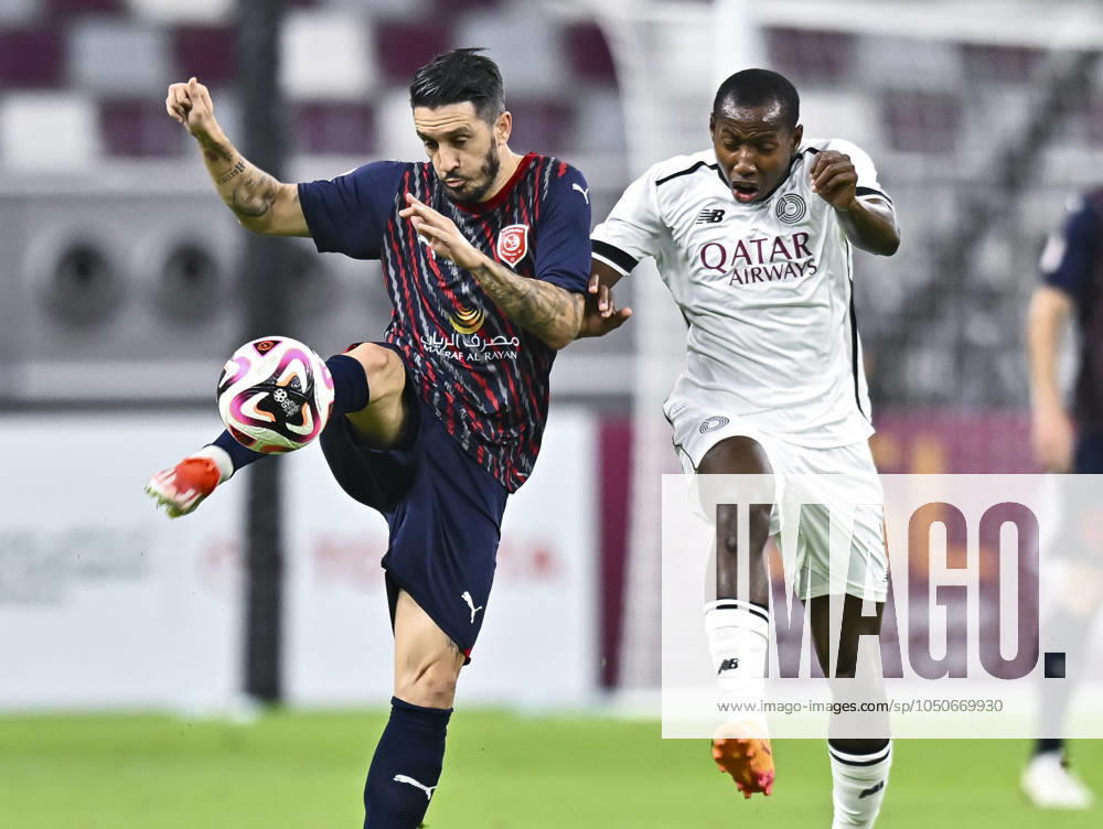 AL-SADD SC VS AL DUHAIL SC-OOREDOO STARS LEAGUE QATAR Mohamed Camara (R) of Al-Sadd SC and Luis Alberto (L) of Al Duhail SC in action during the Ooredoo Qatar Stars League 24 25 match between Al-Sadd SC and Al Duhail SC at Jassim bin Hamad Stadium in Doha, Qatar, on September 21, 2024. DOHA Qatar