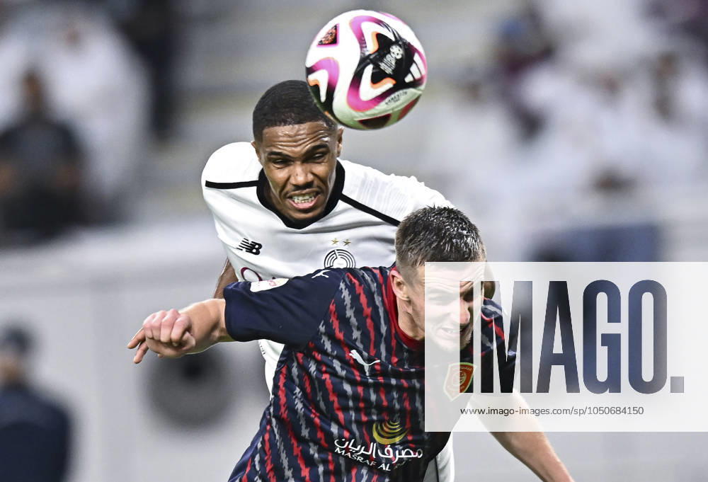 AL-SADD SC VS AL DUHAIL SC-OOREDOO STARS LEAGUE QATAR Pedro Miguel Correia (L) of Al-Sadd SC and Benjamin Bourigeaud (R) of Al Duhail SC in action during the Ooredoo Qatar Stars League 24 25 match between Al-Sadd SC and Al Duhail SC at Jassim bin Hamad Stadium in Doha, Qatar, on September 21, 2024. DOHA Qatar