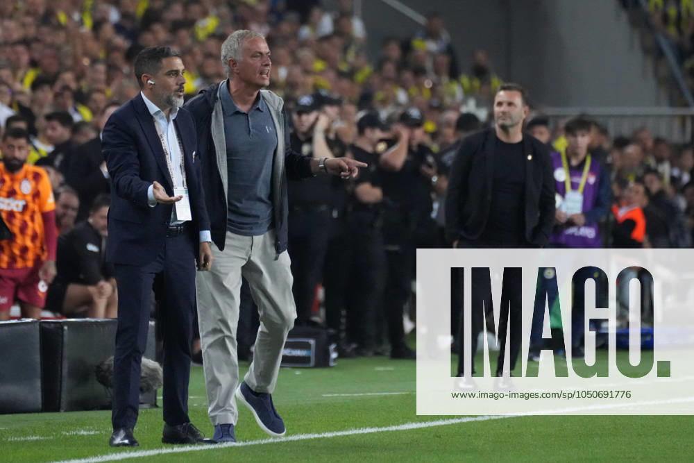 Coach Jose Mourinho of Fenerbahce and Coach Okan Buruk (R) of Galatasaray during the Turkish Super League derby match between Fenerbahce and Glaatasaray at Ulker Stadium in Istanbul , Turkey on September 21 , 2024.. ( Photo by Seskimphoto ) Istanbul Turkey Istanbul Turkey