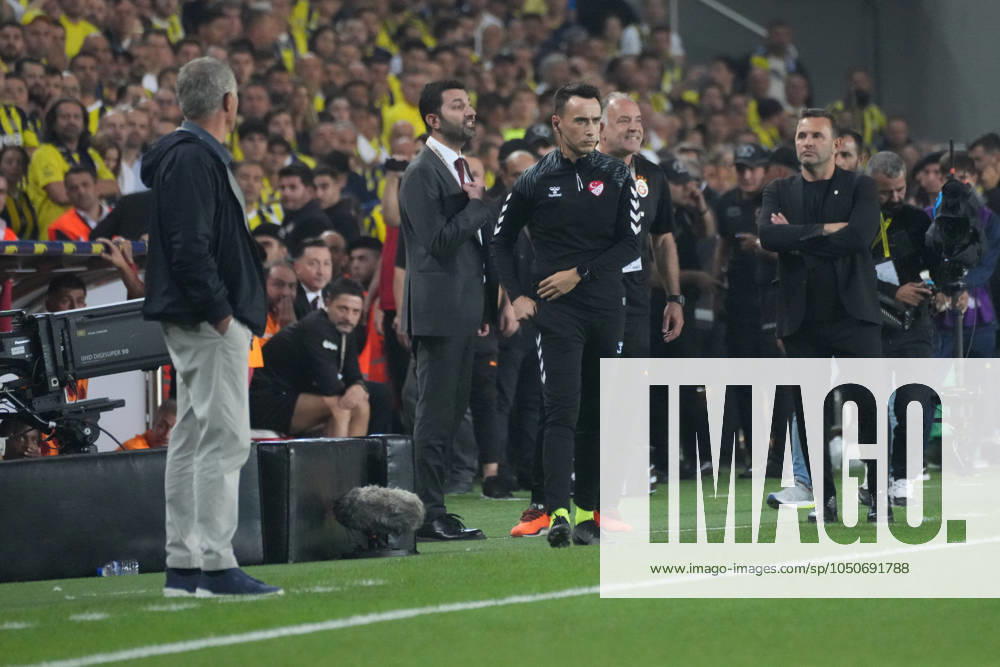 Coach Jose Mourinho of Fenerbahce and Coach Okan Buruk (R) of Galatasaray during the Turkish Super League derby match between Fenerbahce and Glaatasaray at Ulker Stadium in Istanbul , Turkey on September 21 , 2024.. ( Photo by Seskimphoto ) Istanbul Turkey Istanbul Turkey