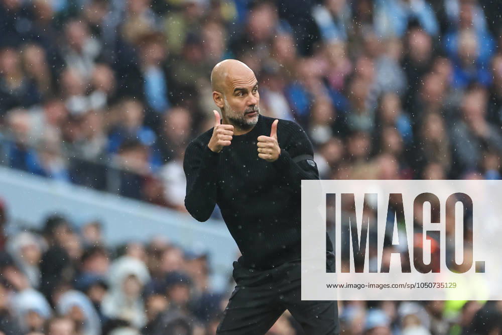 Premier League Manchester City v Arsenal Pep Guardiola manager of Manchester City gives the thumbs up to his team during the Premier League match Manchester City vs Arsenal at Etihad Stadium, Manchester, United Kingdom, 22nd September 2024 (Photo by Mark Cosgrove News Images)