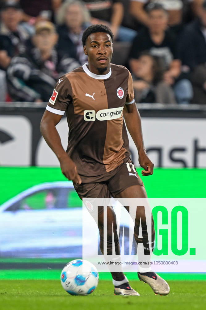 Soccer 1 Bundesliga FC St Pauli RB Leipzig on 22 09 2024 at Millerntor Stadium in Hamburg Oladapo Afolayan St Pauli on the ball MT