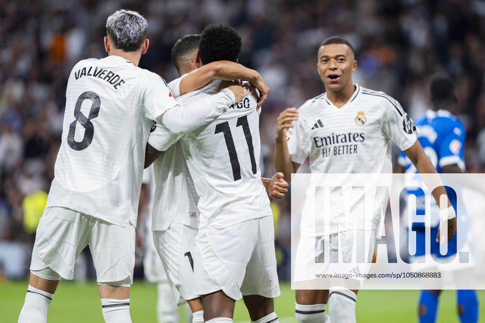 Real Madrid CF vs Deportivo Alaves - La Liga EA Sports 2024 25 Rodrygo Silva de Goes of Real Madrid CF (C) celebrates his goal with Federico Valverde of Real Madrid CF (L) and Kylian Mbappe of Real Madrid CF (R) during the La Liga EA Sports 2024 25 football match between Real Madrid CF vs Deportivo Alaves at Estadio Santiago Bernabeu on September 24, 2024 in Madrid, Spain. Madrid Estadio Santiago Bernabeu Madrid Spain