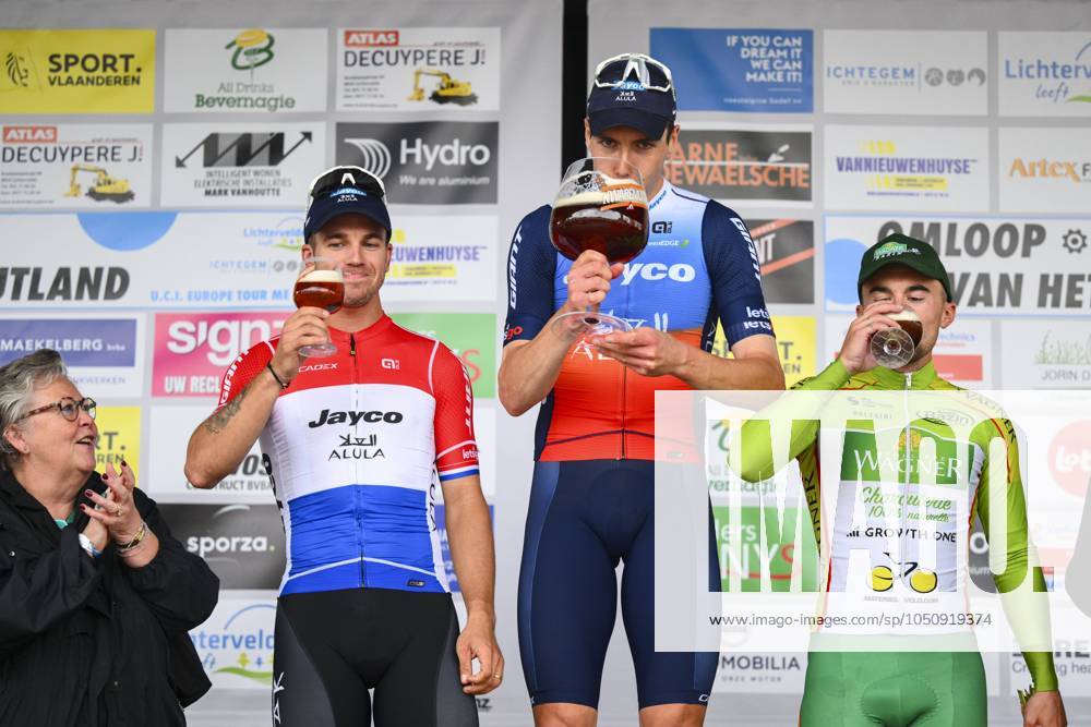KW39 OMLOOP VAN HET HOUTLAND 2024 LICHTERVELDE, BELGIUM - SEPTEMBER 25 : Walscheid Max (GER) of Team Jayco AlUla, Groenewegen Dylan (NED) of Team Jayco AlUla, Barbier Pierre of Team Philippe Wagner Bazin on the podium pictured during the Omloop van het Houtland 2024 Cycling race with start in Eernegem and finish in Lichtervelde (195,3km). On September 25, 2024 in Lichtervelde, Belgium, 25-09-24 Lichtervelde Belgium