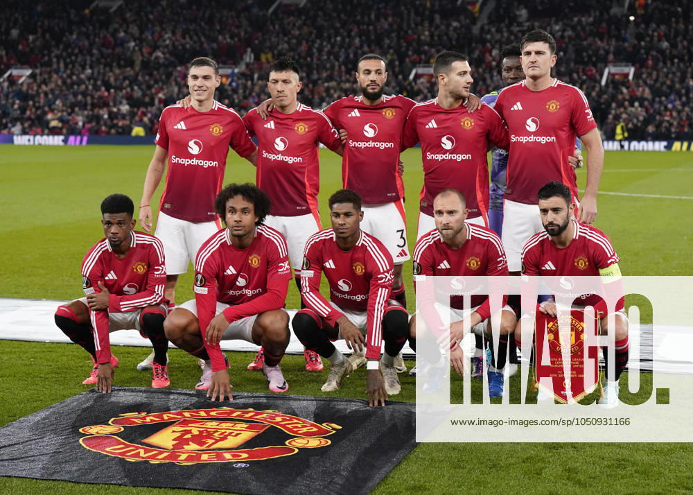 Manchester, England, 25th September 2024. Back row: Manuel Ugarte, Lisandro Martinez, Noussair Mazraoui Diogo Dalot, Harry Maguire as Andrà Onana of Manchester United, ManU attempts to hide behind Maguire. Front row: Amad Diallo, Joshua Zirkzee, Marcus Rashford, Christian Eriksen and Bruno Fernandes of Manchester United during the UEFA Europa League match at Old Trafford, Manchester. Picture credit should read: Andrew Yates Sportimage . SPI-3332-0023