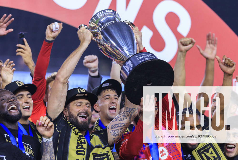 Olivier Giroud 9 of the Los Angeles Football Club lifts the trophy during their award ceremony after winning their U.S. Open Cup Final against the Sporting Kansas City on Wednesday September 25, 2024 at the BMO Stadium in Los Angeles, California. LAFC defeats Sporting Kansas City, 3-1 and wins the U.S. Open Cup Final. ARIANA RUIZ PI Los Angeles U.S - ZUMAp124 20240925_zaa_p124_008